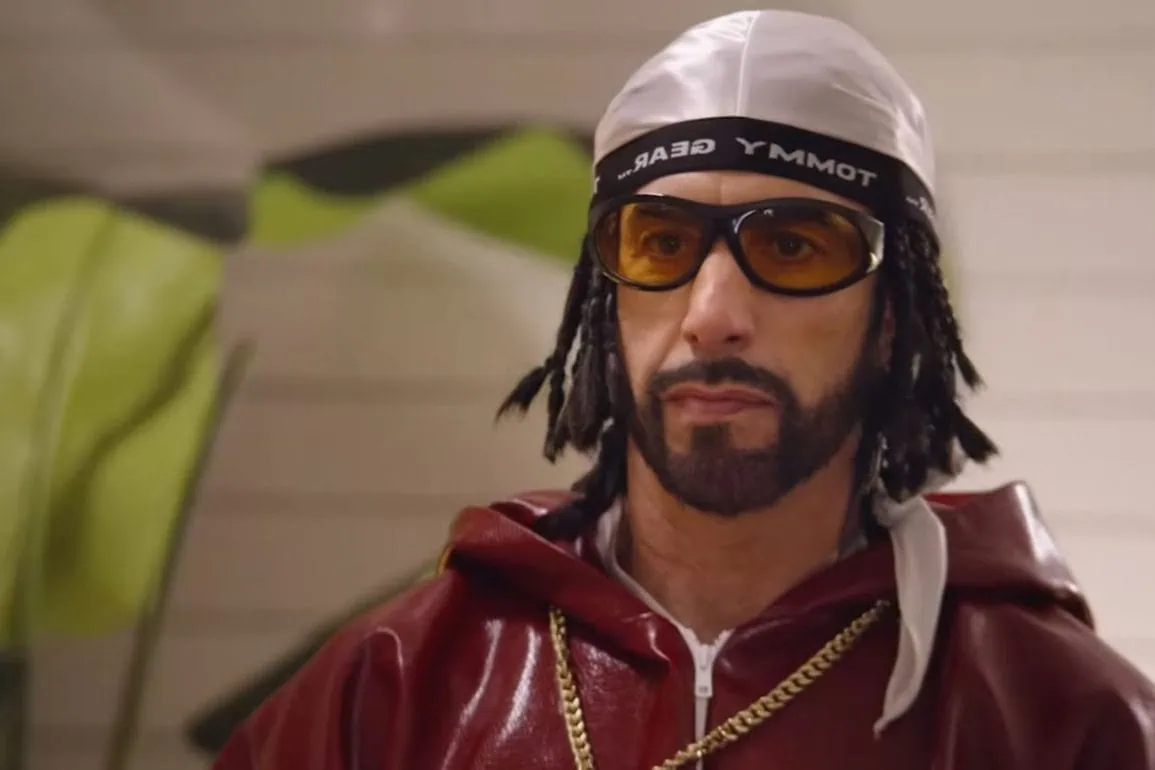 Nouvelle Bande annonce de Ali G: Who Iz I? (2026) : Sacha Baron Cohen relance son personnage culte aux États-Unis 1 Nouvelle Bande annonce de Ali G: Who Iz I? (2026) : Sacha Baron Cohen relance son personnage culte aux États-Unis